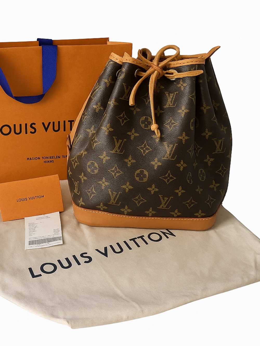 Louis Vuitton Monogram Bucket Bag with Vachetta Trim in Brown